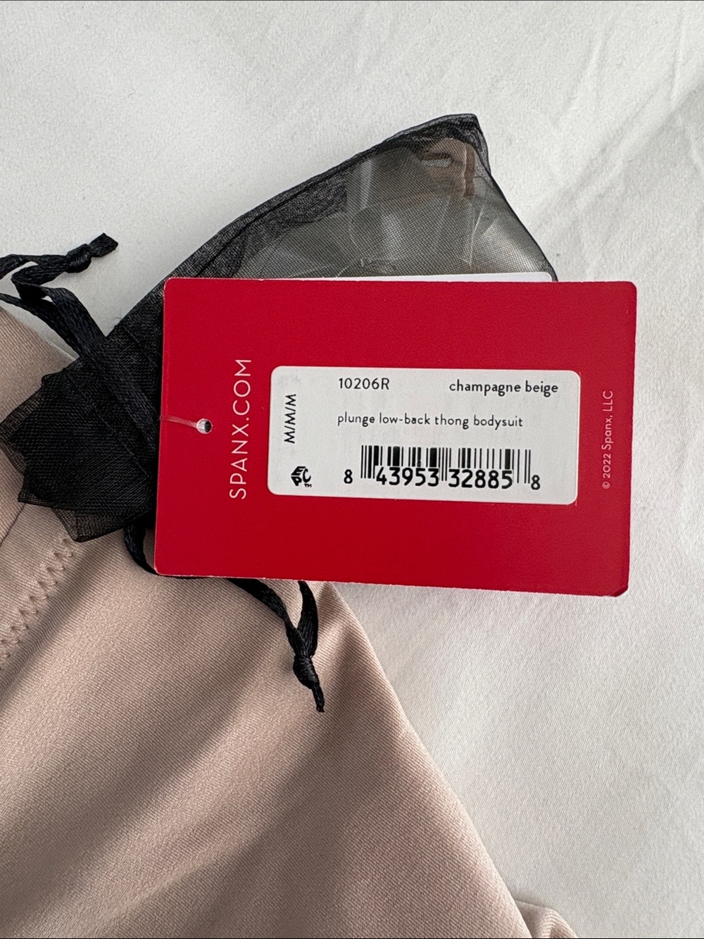 SPANXshape® Suit Your Fancy
Plunge Low-Back Thong Bodysuit - M - Picture 6 of 9